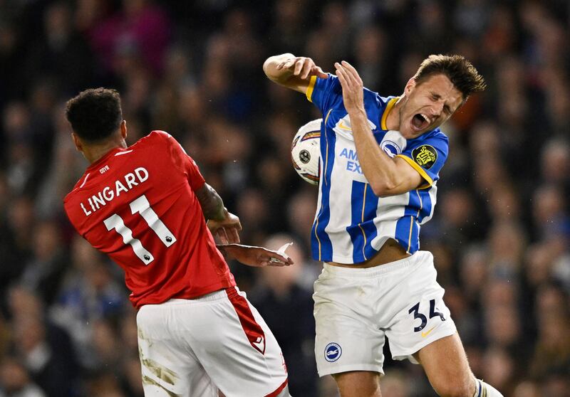 Nottingham Forest's Jesse Lingard in action with Brighton & Hove Albion's Joel Veltman. Reuters