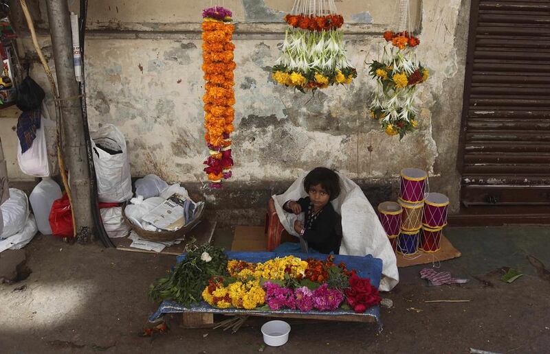 Walk through a bazaar in India and you will probably see women sitting cross legged on the floor, tying jasmine into long strings with lightning speed. Rafiq Maqbool / AP Photo