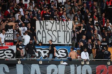 PSG fans display a banner reading 'Neymar Go Away!' before to the Ligue 1 match between Paris Saint-Germain and Nimes at the Parc des Princes in August. EPA
