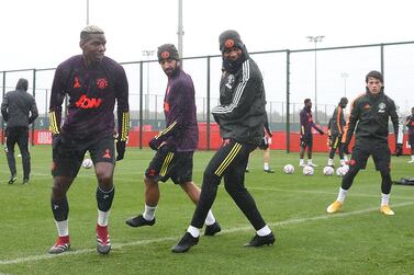 Paul Pogba, Bruno Fernandes and Anthony Martial in training. Getty