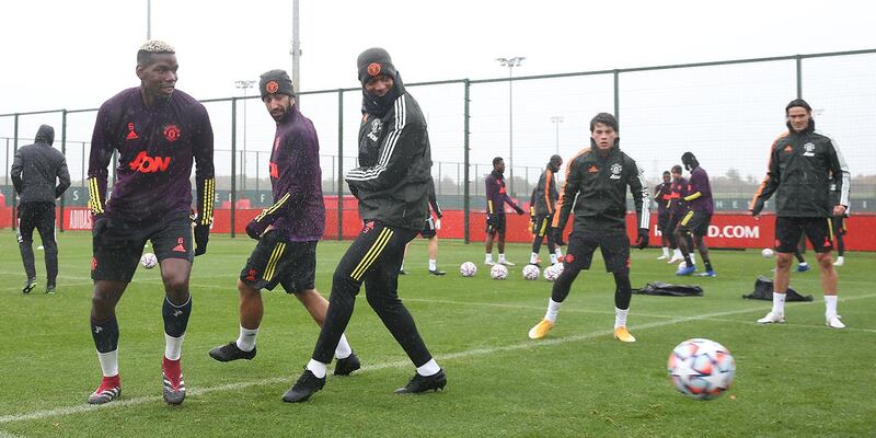 MANCHESTER, ENGLAND - OCTOBER 27: Paul Pogba, Bruno Fernandes, Anthony Martial, Facundo Pellistri, Edinson Cavani of Manchester United in action during a first team training session ahead of the UEFA Champions League Group H stage match between Manchester United and RB Leipzig at Aon Training Complex on October 27, 2020 in Manchester, England. (Photo by Matthew Peters/Manchester United via Getty Images)