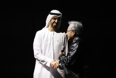 Omar Sultan Al Olama, UAE's Minister of State for Artificial Intelligence, Digital Economy and Remote Work Applications, with Nvidia chief executive Jensen Huang. Chris Whiteoak / The National