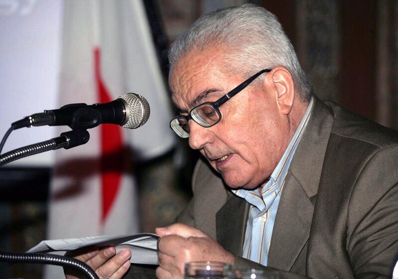 In this undated photo released Tuesday, Aug. 18, 2015 by the Syrian official news agency SANA, one of  Syria's most prominent antiquities scholars, Khaled al-Asaad, speaks in Syria. Islamic State militants beheaded al-Asaad in the ancient town of Palmyra, Syria, then strapped his body to one of the town's Roman columns, Syrian state media and an activist group said Wednesday. The killing of 81-year-old al-Asaad was the latest atrocity perpetrated by the militant group, which has captured a third of both Syria and Iraq. (SANA via AP)