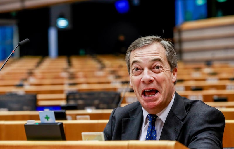 epa07196858 Nigel Farage, vice chairman of pro-Brexit campaign group 'Leave means Leave' waits to listen to Michel Barnier (not pictured), the European Chief Negotiator of the Task Force for the Preparation and Conduct of the Negotiations with the United Kingdom under Article 50, giving a speech on the Britain's withdrawal from the European Union during a plenary session at the European Parliament in Brussels, Belgium, 29 November 2018.  EPA/STEPHANIE LECOCQ