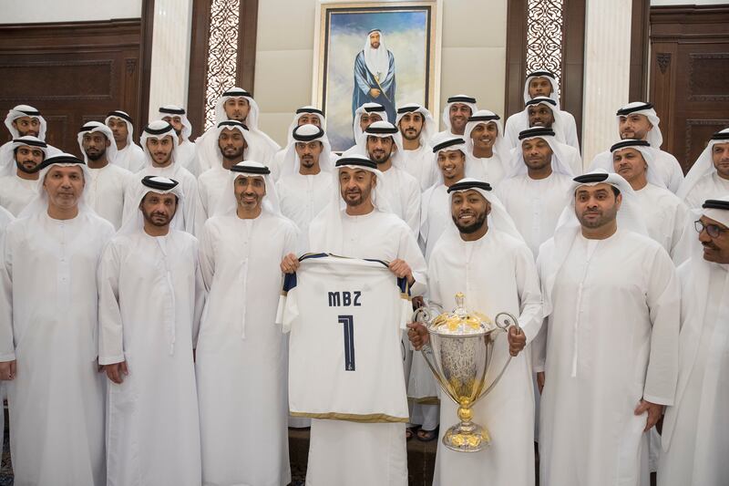 ABU DHABI, UNITED ARAB EMIRATES - May 31, 2017: HH Sheikh Mohamed bin Zayed Al Nahyan Crown Prince of Abu Dhabi Deputy Supreme Commander of the UAE Armed Forces (front row 4th R) and HH Sheikh Diab bin Zayed Al Nahyan (front row 5th R) stand for a photograph with Al Wahda Football Club members during an iftar reception at Al Bateen Palace. 
( Mohamed Al Hammadi / Crown Prince Court - Abu Dhabi )
--- *** Local Caption ***  20170531MH_C215158.jpg