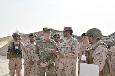 US Gen James McConville speaks with Lt Gen Saleh Mohammed Saleh Al Ameri, commander of the UAE Land Forces, on Tuesday. Wam