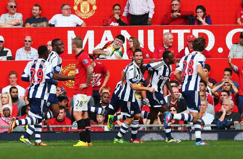 Saido Berahino, second right, celebrates what was the winning goal against Manchester United with his West Brom teammates. Alex Livesey / Getty images