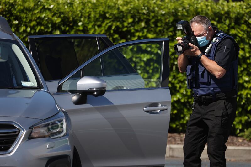 Police forensic staff continue to gather evidence. Getty Images
