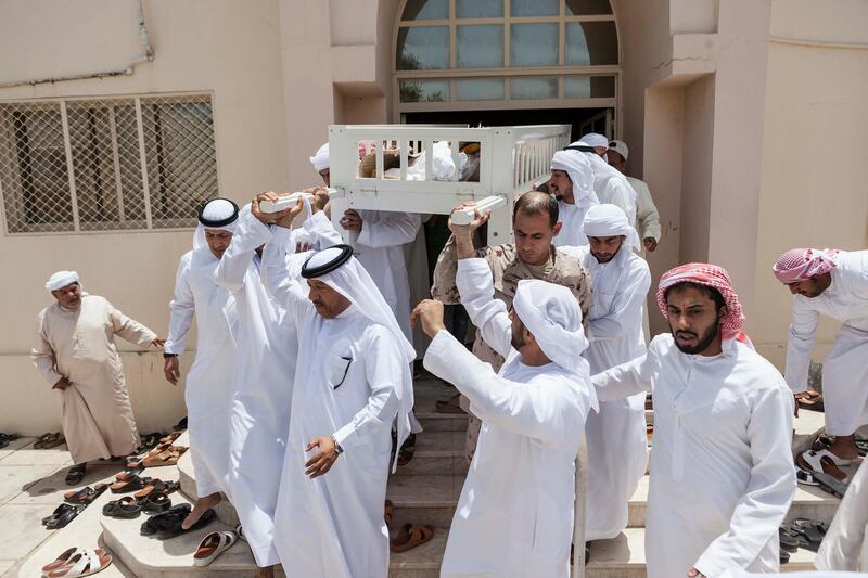 FUJEIRAH, UNITED ARAB EMIRATES, 19 JUNE 2017. The funeral of Emirati Athlete Abdullah Hayayei in Qidfa that died from an accident in London while training. Abdullah's remains leave the Zaid Bin Khatieb Mosque on it's way to the burial site. (Photo: Antonie Robertson/The National) Journalist: Ruba Haza. Section: National.