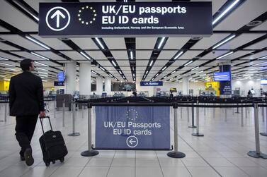 The UK’s Border Force officers check the passports of passengers arriving at Gatwick Airport, London, before freedom of movement with the EU ended. Getty