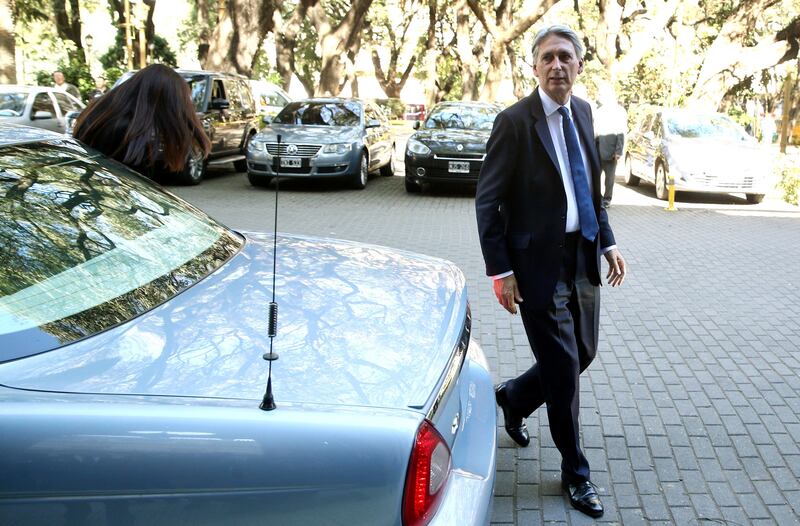 Britain's Chancellor of the Exchequer Philip Hammond arrives at San Martin Palace in Buenos Aires, Argentina August 2, 2017. REUTERS/Marcos Brindicci