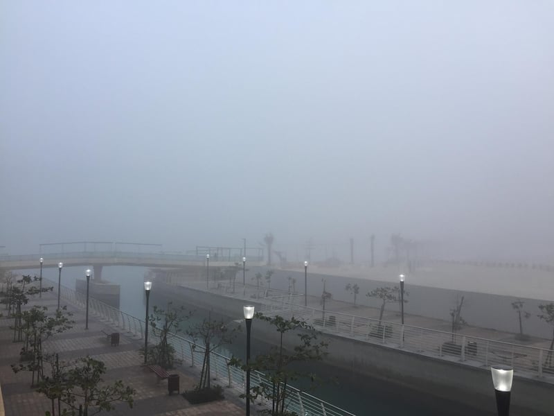 A foggy morning on Reem Island, Abu Dhabi. Jason Von Berg / The National