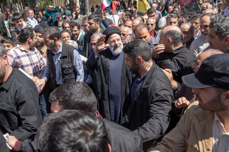 Iranian President Ebrahim Raisi attended the public funerals of seven Islamic Revolutionary Guard Corps members killed in an Israeli strike in Syria. The funerals coincided with Quds Day commemorations in Tehran. Getty Images