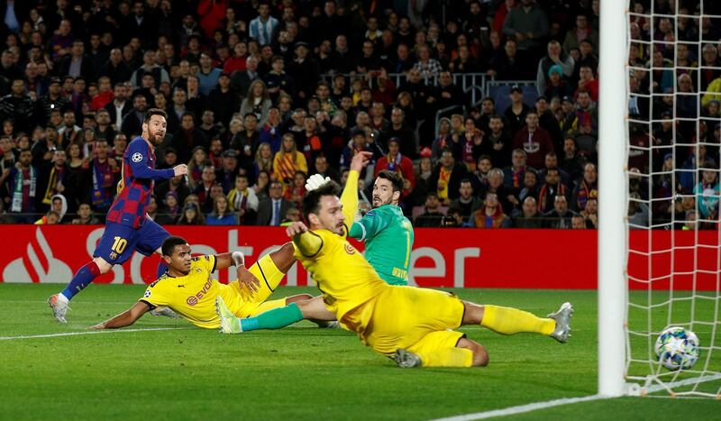 Barcelona's Lionel Messi scores their second goal. Reuters