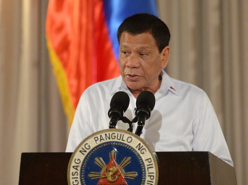 Philippine President Rodrigo Duterte delivers a speech during a ceremony for a proposed draft of the Bangsamoro Basic Law (BBL) at the Malacanang Palace in Manila on July 17, 2017.
Duterte offered "genuine autonomy" to the Philippines' Muslim minority on July 17 to help him defeat Islamist militants who seized a southern city in the gravest challenge to his year-old rule. / AFP PHOTO / TED ALJIBE