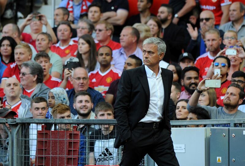 Manchester United manager Jose Mourinho walks off the pitch at halftime of the English Premier League soccer match between Manchester United and Leicester City at Old Trafford in Manchester, England, Saturday, Aug. 26, 2017. (AP Photo/Rui Vieira)