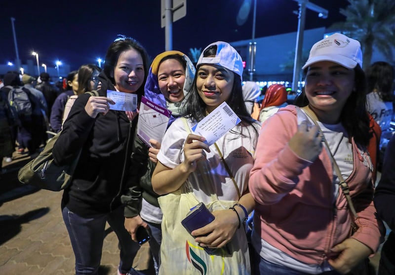 Abu Dhabi, U.A.E., February 5, 2019.   Worshipers heading onto buses at Nation Towers before they're transported to the mass. --  Ticket holders patiently wait for the bus to the mass.
Victor Besa/The National
Section:  NA
Reporter: