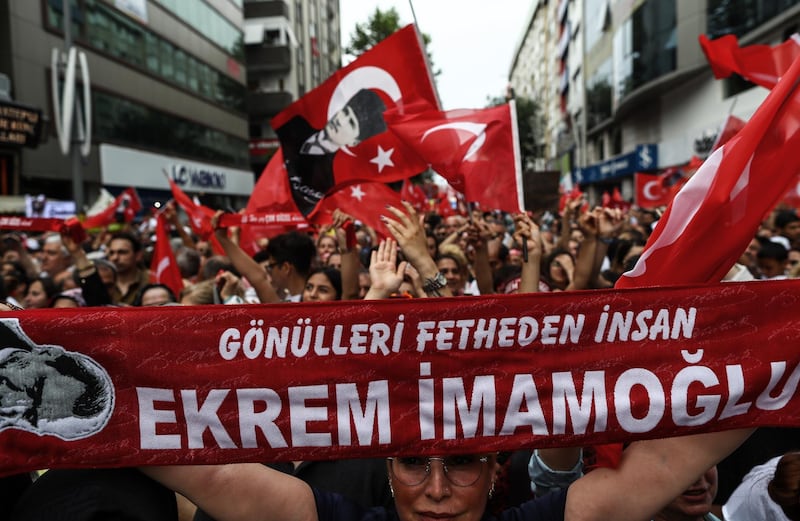 epa07658572 Supporters of Republican People's Party 'CHP' candidate for Istanbul mayor Ekrem Imamoglu hold banners and flags during his repeated election campaign rally in Istanbul, Turkey, 19 June 2019. According to media reports, the Turkish Electoral Commission has ordered a repeat of the mayoral election in Istanbul on 23 June, after Turkish President Recep Tayyip Erdogan's AK Party had alleged there was 'corruption' behind his party losing.  EPA/SEDAT SUNA