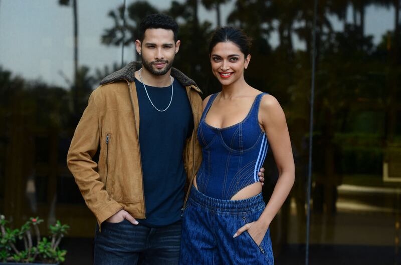 Siddhant Chaturwedi and Padukone promoting their film 'Gehraiyaan' in Mumbai in February 2022. AFP