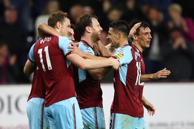 BURNLEY, ENGLAND - APRIL 19:  Ashley Barnes of Burnley celebrates with teammates after scoring his sides first goal during the Premier League match between Burnley and Chelsea at Turf Moor on April 19, 2018 in Burnley, England.  (Photo by Clive Brunskill/Getty Images)