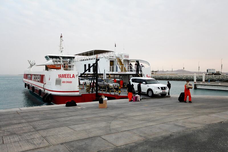 Delma Island, January 8, 2013 -- Passengers disembark from a ferry that just returned from Delma Island in Abu Dhabi, January 14, 2013. (Photo by: Sarah Dea/The National)