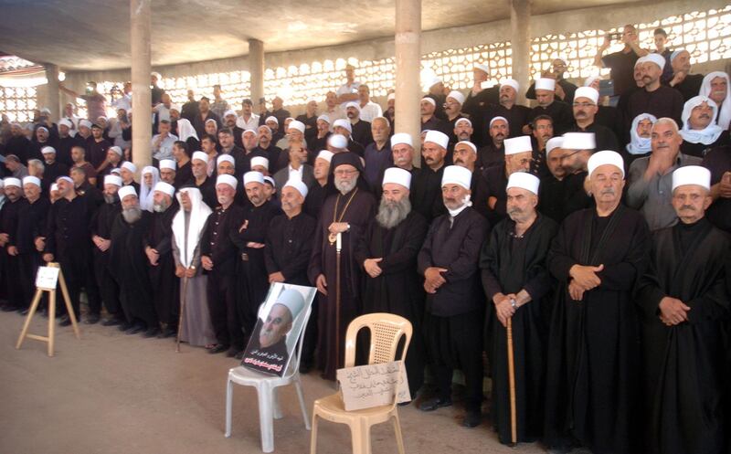 epa06912336 A handout photo made available by Syria's Arab News Agency (SANA) on 26 July 2018 shows the funeral processions for the victims of the suicide bombings that hit al-Sweida province in south Syria a day earlier and claimed the lives of dozens of people and injured scores others. According to media reports, a number of citizens were killed and others were injured in terrorist suicide bombing attacks in Sweida city synchronizing with Daesh (ISIS) attacks on a number of villages in the eastern and northern countryside of the province.  EPA/SANA HANDOUT  HANDOUT EDITORIAL USE ONLY/NO SALES