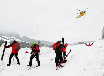 Rescuers during their mission near Fieberbrunn, western Austria, on February 4. AFP