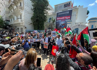 Journalists in Tunis protest the death of Al Jazeera reporter Shireen Abu Akleh, who was killed during an Israeli raid in Jenin in the occupied West Bank, May 11, 2022.  Reuters
