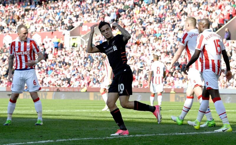 Liverpool playmaker Philippe Coutinho, centre, in action during the 2016/17 season against Stoke City.