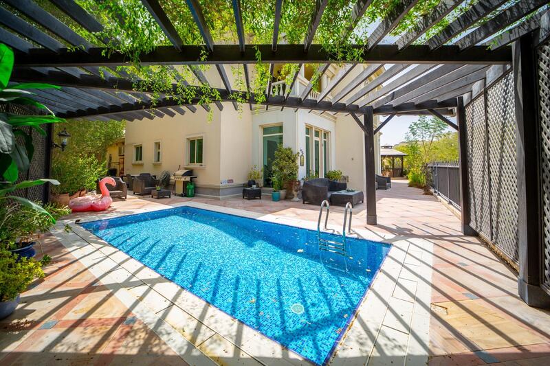 The pool area is snug and shaded. Courtesy LuxuryProperty.com