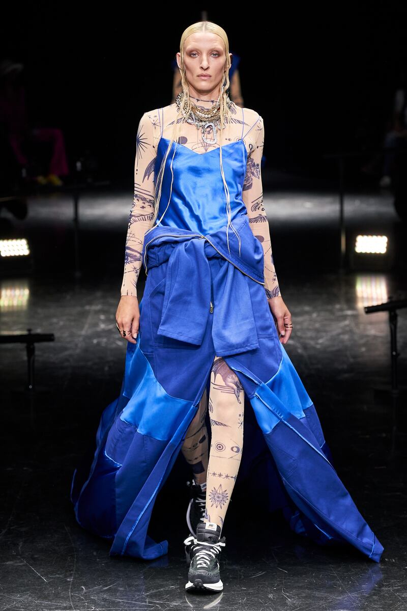 A tracksuit is rethought into a floor-length Jean Paul Gaultier strapless dress.