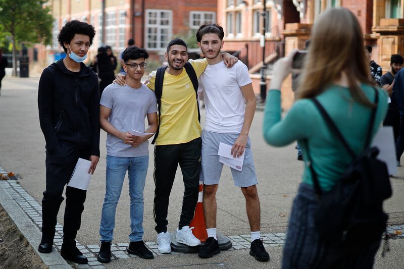 A-Level and GCSE pupils are hoping their teacher-graded results will warrant celebration. AFP