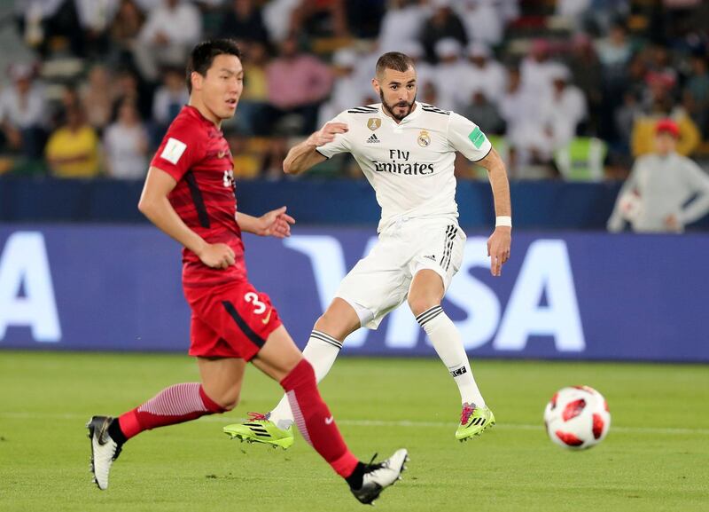 Abu Dhabi, United Arab Emirates - December 19, 2018: Karim Benzema of Real Madrid shoots during the game between Real Madrid and Kashima Antlers in the Fifa Club World Cup semi final. Wednesday the 19th of December 2018 at the Zayed Sports City Stadium, Abu Dhabi. Chris Whiteoak / The National