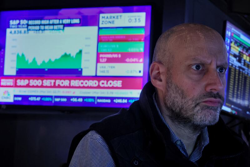 A trader on the floor at the New York Stock Exchange in New York City on January 19, 2024. Reuters