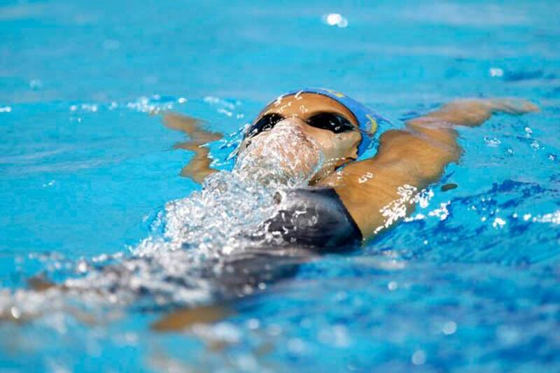 October 08. Daryna Zevina (UKR) during the womens 100m backstroke at the Fina/Arena Swimming World Cup 2011 held at the Hamdan bin Mohammed Al Rashid Sport Complex. October 08, Dubai, United Arab Emirates (Photo: Antonie Robertson/The National)