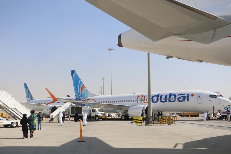 A Boeing Co. 737 MAX8 aircraft, operated by FlyDubai, stands on the tarmac during the 15th Dubai Air Show at Dubai World Central (DWC) in Dubai, United Arab Emirates, on Monday, Nov. 13, 2017. The biennial Dubai expo is an important venue for manufacturers to secure deals for their biggest and most expensive jetliners. Photographer: Natalie Naccache/Bloomberg
