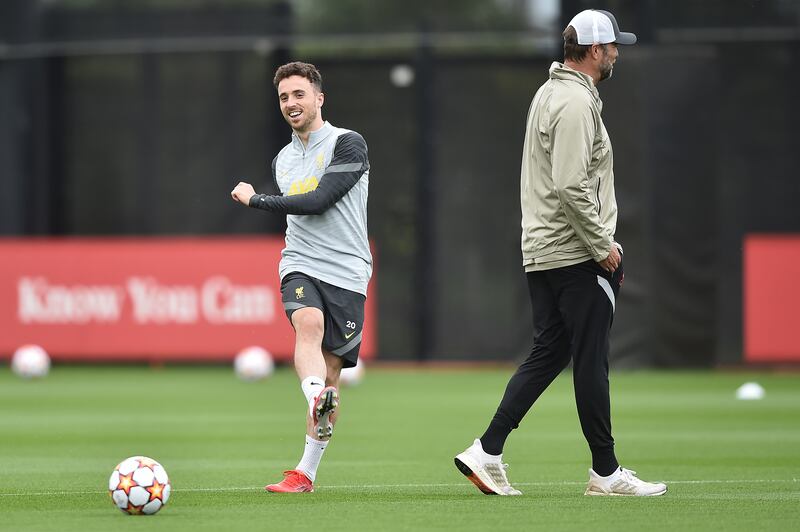 Diogo Jota passes the ball at training. Getty