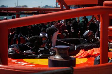 Migrants rescued rescued from dinghies off the Spanish coast in the Strait of Gibraltar arrive in a rescue boat at the port of Algeciras, Spain on July 15, 2018. Jon Nazca / Reuters