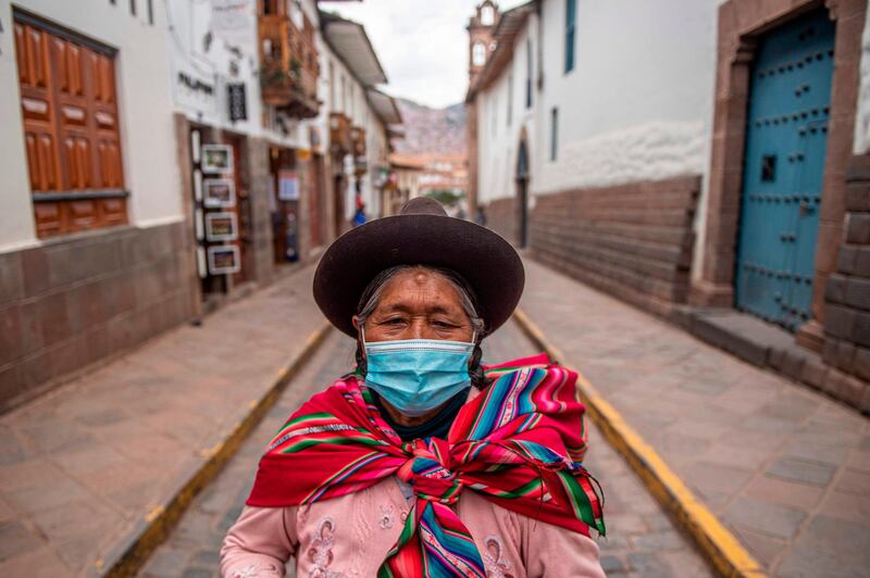 Marcosi, an Andean woman, poses for a picture as she talks with AFP in the city of Cusco, southern Peru, during the coronavirus pandemic. AFP