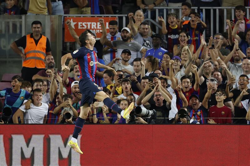 Robert Lewandowski celebrates after scoring Barcelona's third goal. EPA