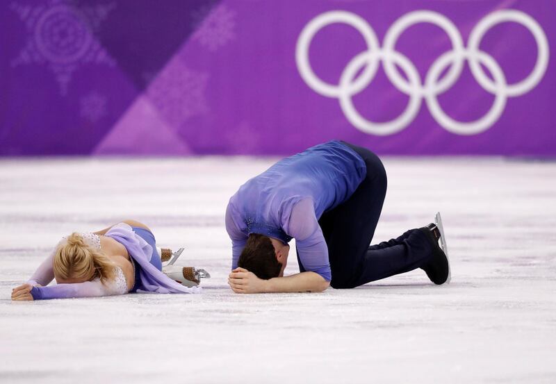 Aljona Savchenko and Bruno Massot of Germany react after finishing their performance in the Pair Skating free skating competition final . Damir Sagolj / Reuters