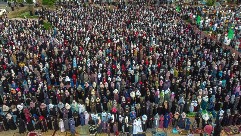 Palestinians gather to pray in Gaza City, during Eid Al Adha.  AFP
