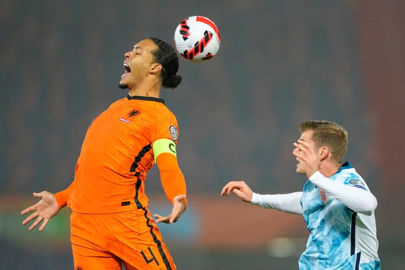 Netherlands' Virgil van Dijk, left, competes with Norway's Alexander Sorloth. AP Photo
