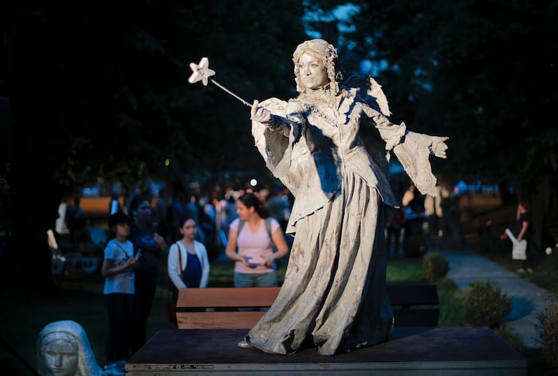 An artist of The Netherlands' Levend Theater performs the Angel character during the Living Statues International Festival, in Bucharest, Romania. Vadim Ghirda / AP Photo