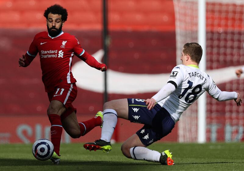 Matt Targett - 6: The left back acquitted himself well against Salah. His set-piece delivery that created a chance for Konsa was excellent and he looked a threat going forward. AFP