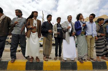 Protesters during the trial of the Bahai leader Hamed bin Haydara, outside the state security court in Sanaa. EPA