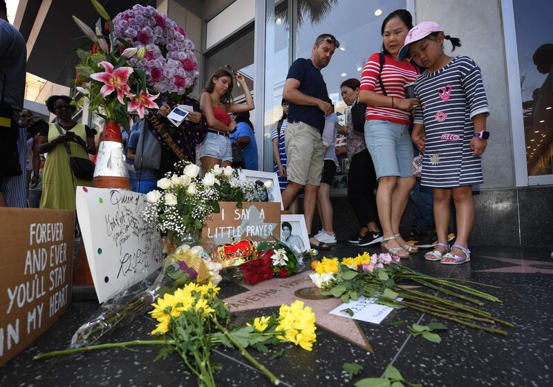 Flowers and tributes are placed on the Star for Aretha Franklin on the Hollywood Walk of Fame. AFP