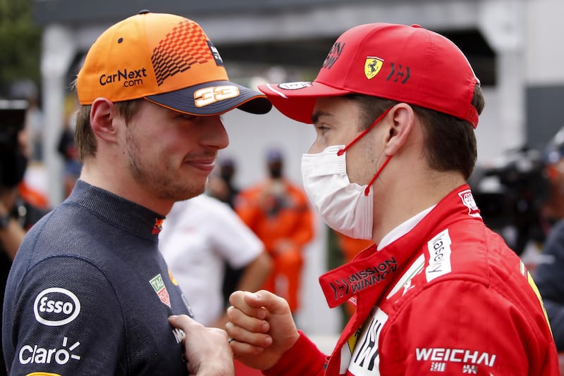Ferrari driver Charles Leclerc with Red Bull driver Max Verstappen after the qualifying session of the Monaco Grand Prix on Saturday, May 22. EPA