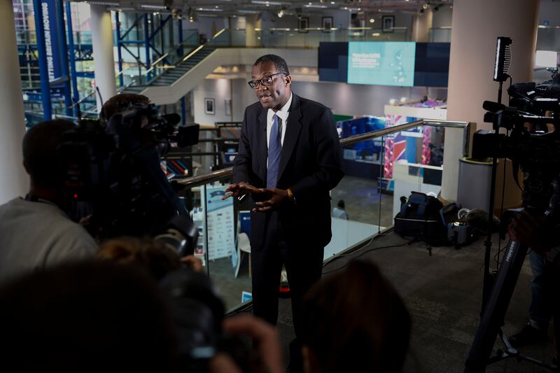 Mr Kwarteng gives an interview on the second day of  Conservative Party conference. Getty Images