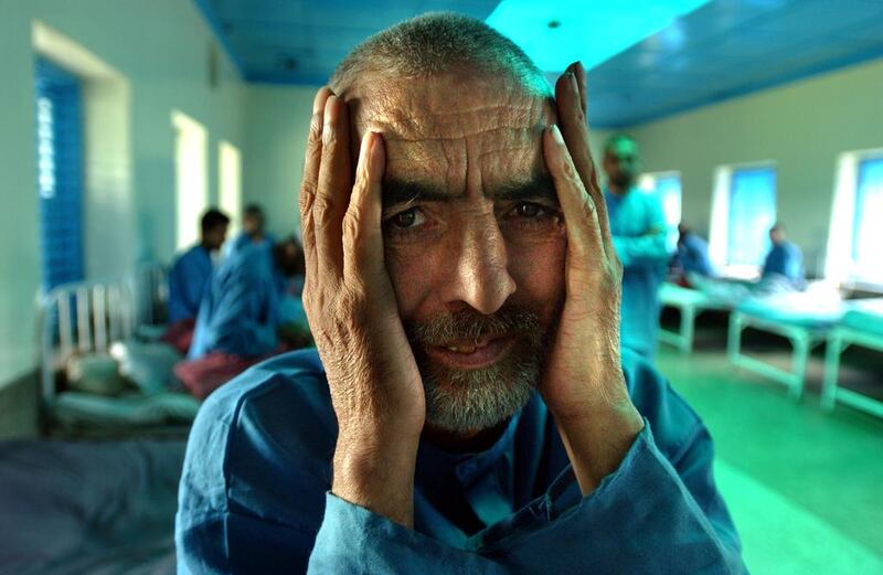 A Kashmiri man sits on a hospital bed in Srinagar, Kashmir. The long-running insurgency has killed tens of thousands and left many more with severe mental traumas. Ami Vitale / Getty Images

